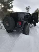 jeep stuck in snow.webp